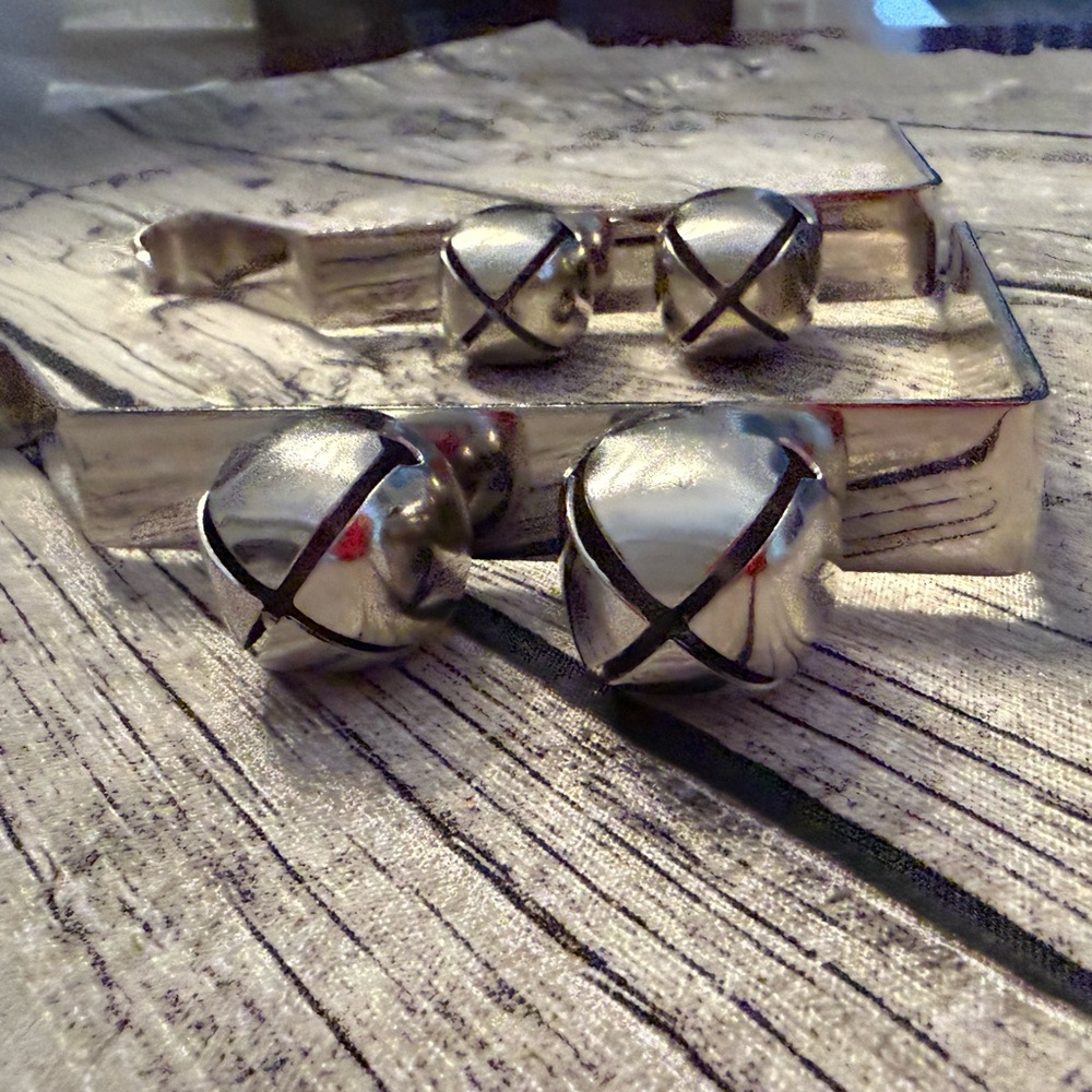 Like new. Silver Metal Hooks with jingle bells - Set of 2. Great for mantels!